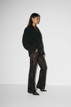 Rina - Modieuze Dames Transparante Bloemenkant Overlay Broek