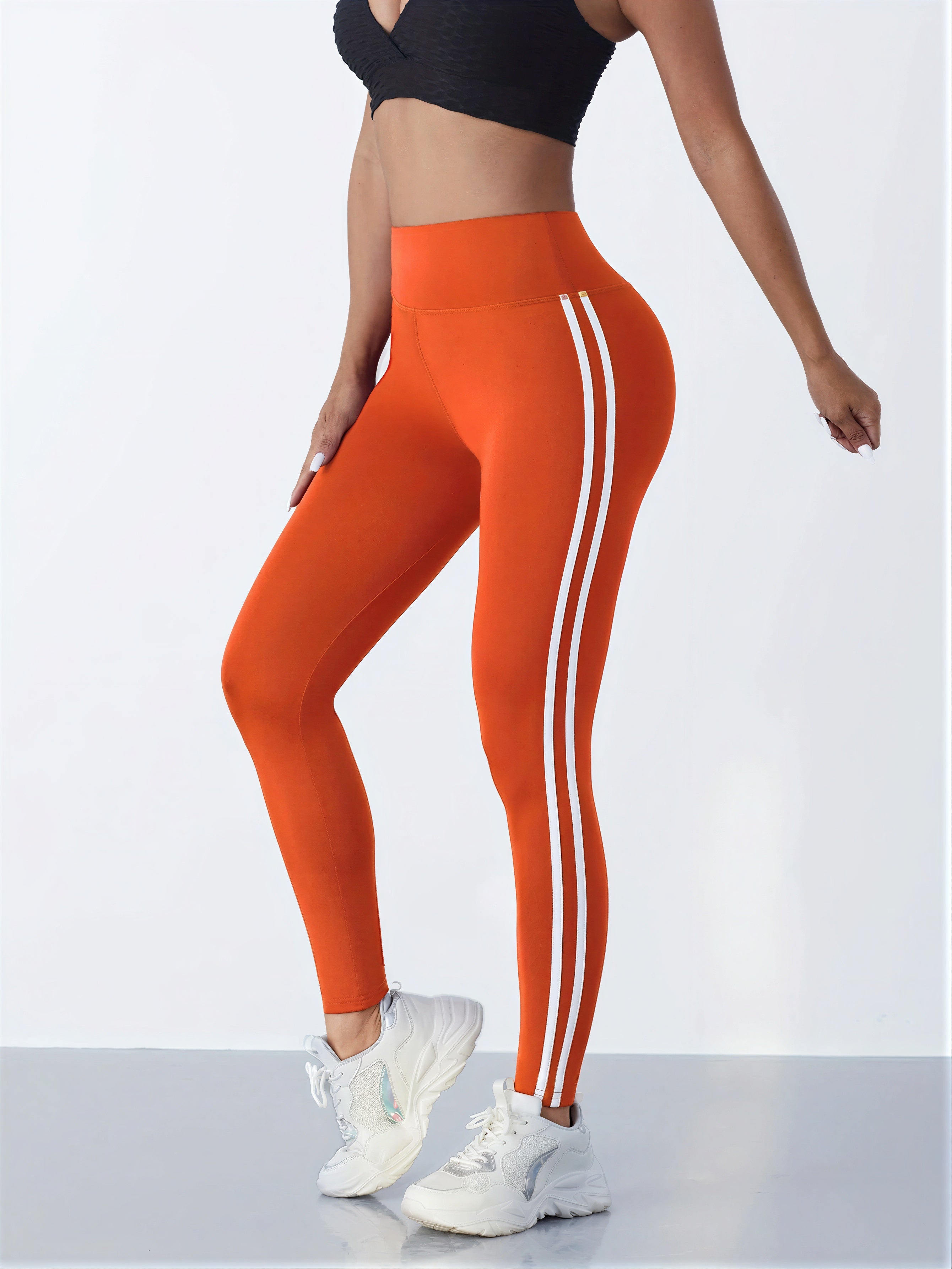 Rebbecca - Athletes and fitness enthusiasts Dual white side stripes Leggings