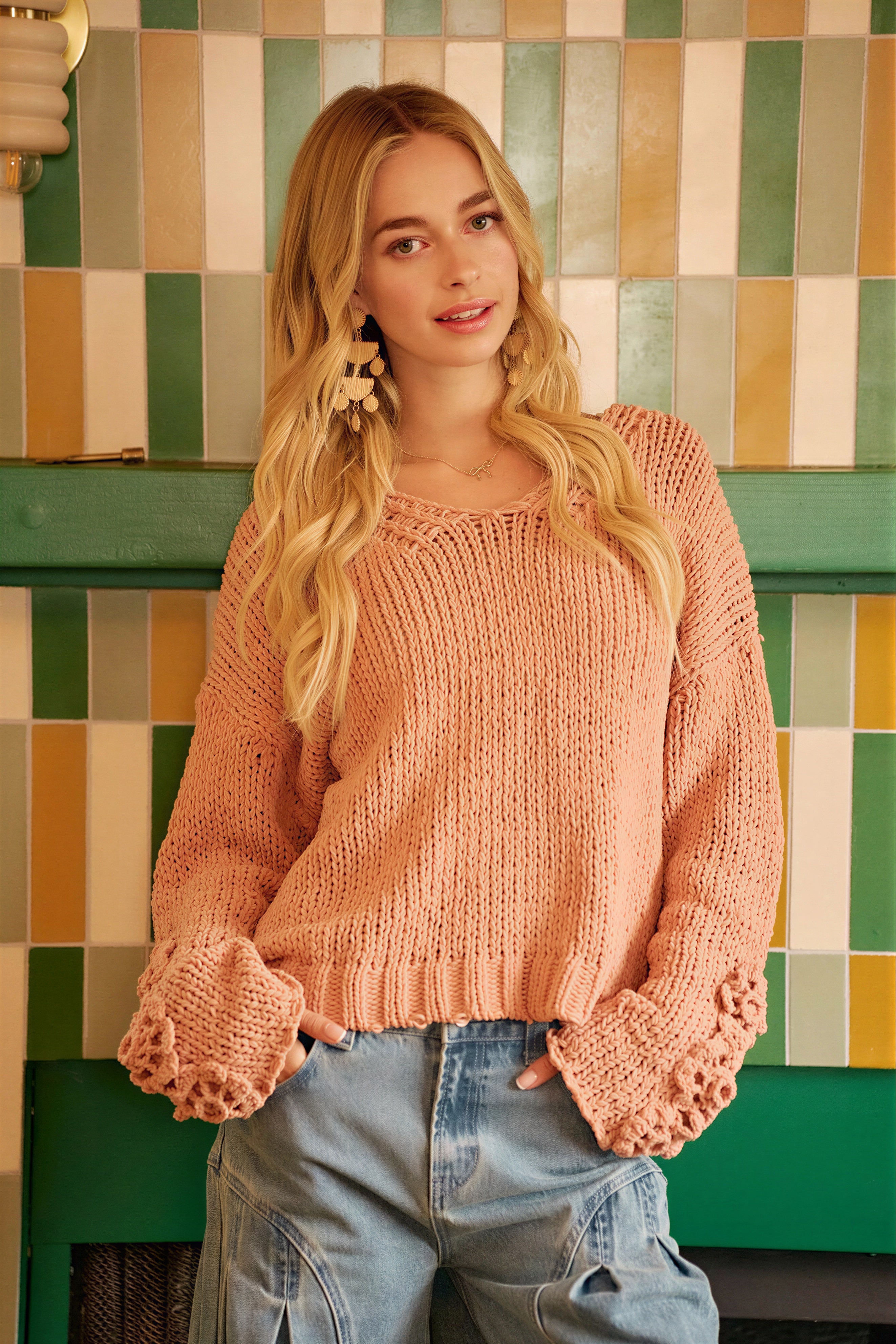 Estephanie - Women Textured V-neck and decorative cuff detail Sweater